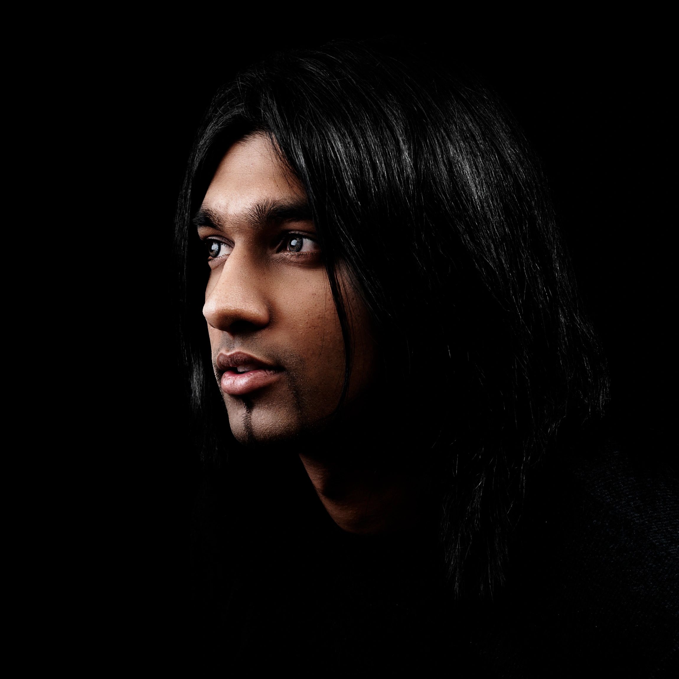 Creative close-up portrait in dramatic light