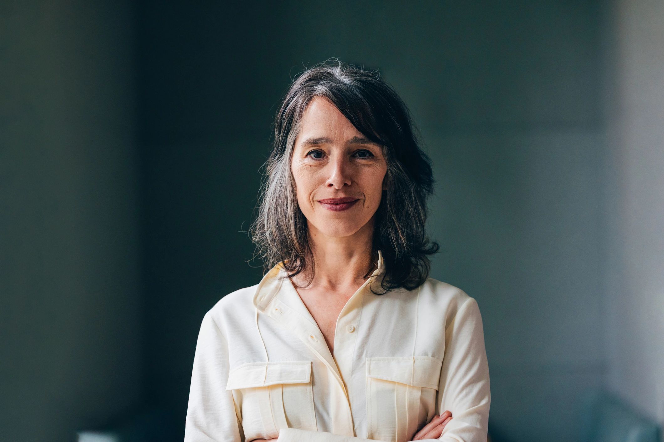 Studio portrait of a woman with a calm expression