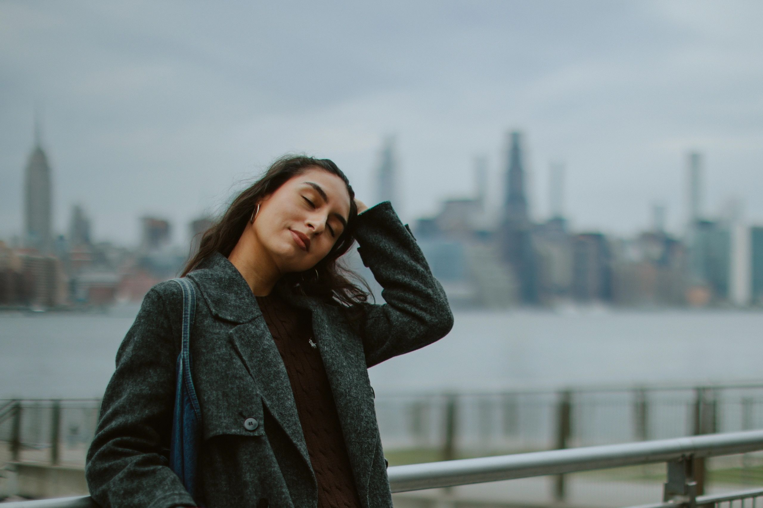 Lifestyle portrait with New York skyline in the background